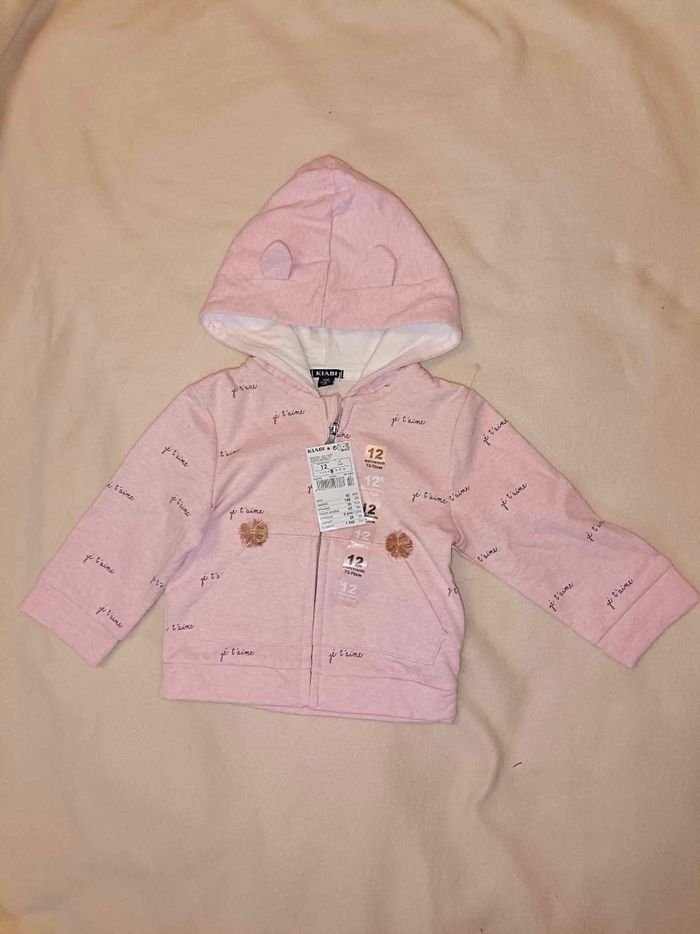 Gilet neuf 12 mois