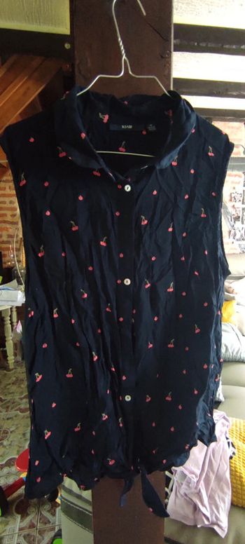 Top chemise sans manches avec noeud