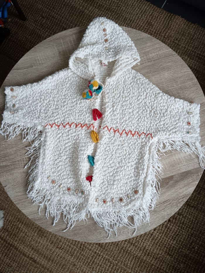 Ponchos dessus de manteaux