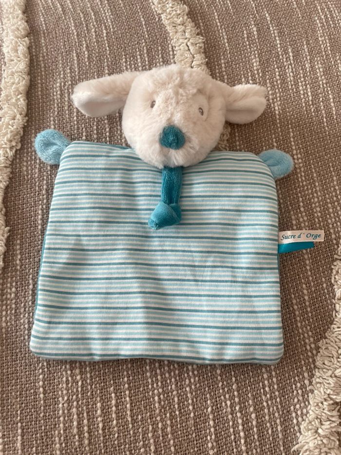 Peluche doudou plat 23cm sucre d’orge chien blanc et bleu parfait état