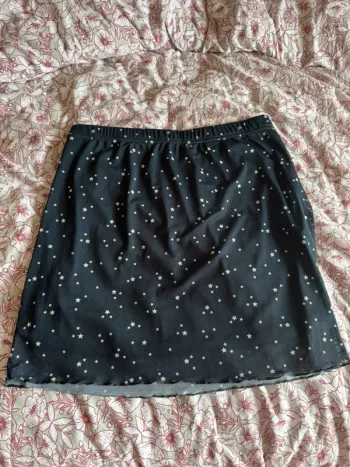 Jupe courte noire à motifs étoiles blanches Pimkie taille L
