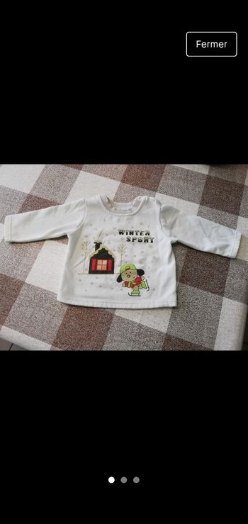 Pull 12 mois blanc winter sport 2€