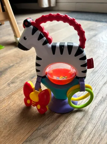 Zebre d'activités à ventouser Fischer price TBE