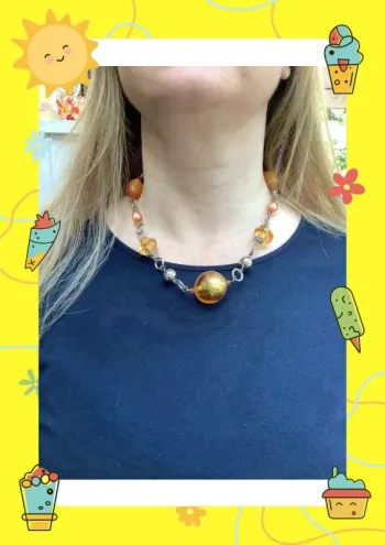 Collier orangé argenté avec boules