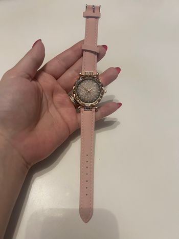 Montre à aiguille NEUVE pour femme couleurs rose et doré