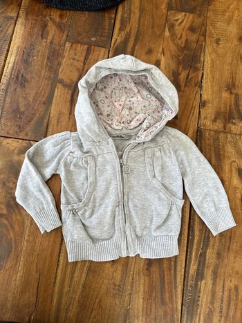 Gilet capuche tape à l’œil