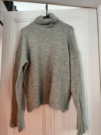 Pull col roulé