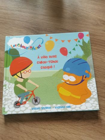 Les Caboux-Tchoux. À vélo avec Cabou-Tchou casqué !