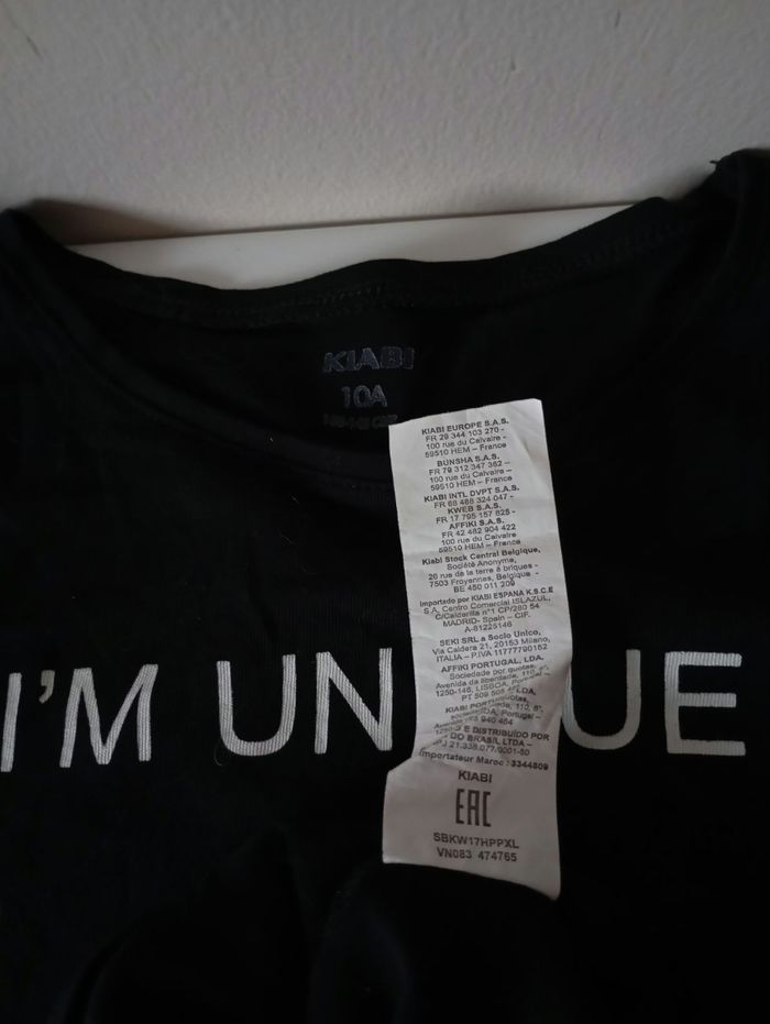 Tee-shirt noir ,10 ans ,manches longues,coton ,écriture blanche. Kiabi . État neuf. - photo numéro 8