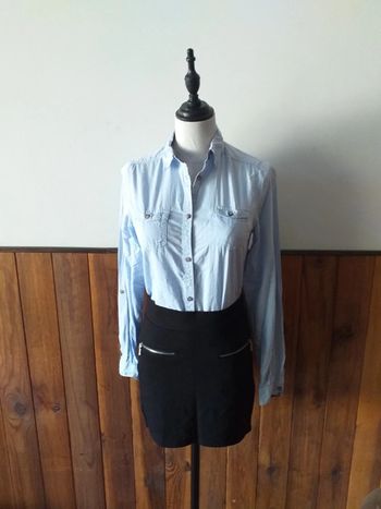 Chemise bleu avec poches