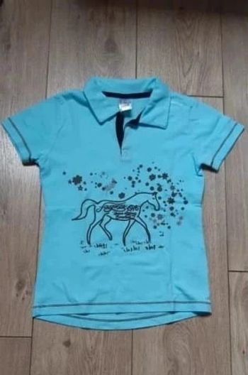 Tee-shirt d'équitation "fouganza" bleu clair 8 ans neuf jamais porté