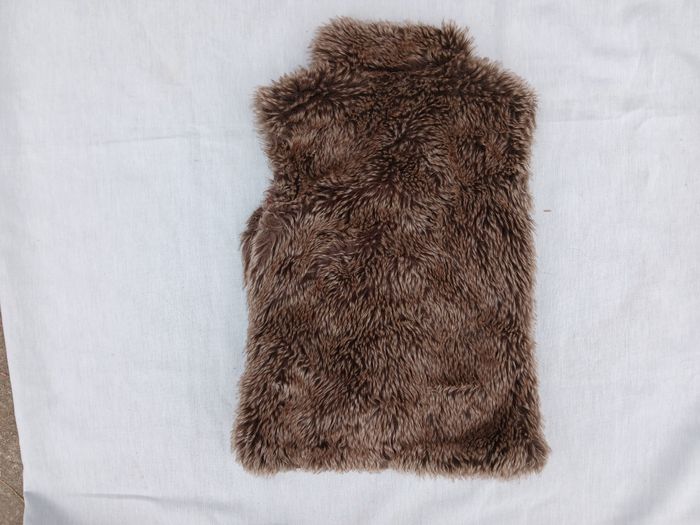 veste sans  manche - photo numéro 2