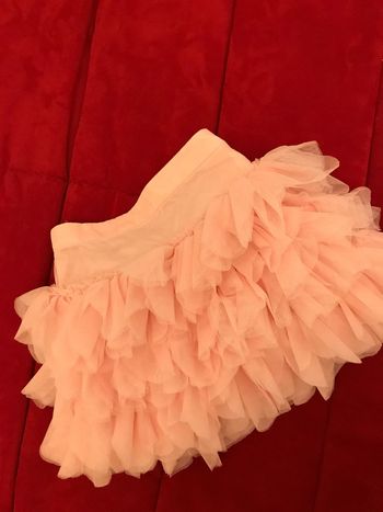 Jupe courte à volants de tulle rose