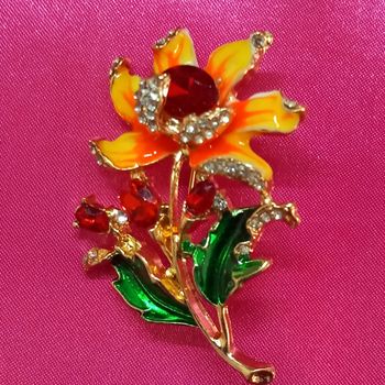  Broche tournesol en métal doré et strass