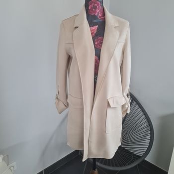 Magnifique manteau effet peau de pêche 