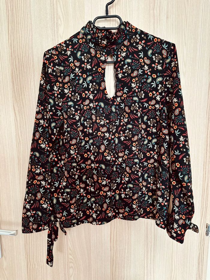 Blouse fleurie manches longues dos ouvert noir multicolore taille 38 Morgan