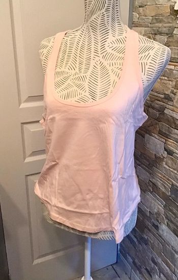 Débardeur court taille M rose clair de la marque Pink Sin