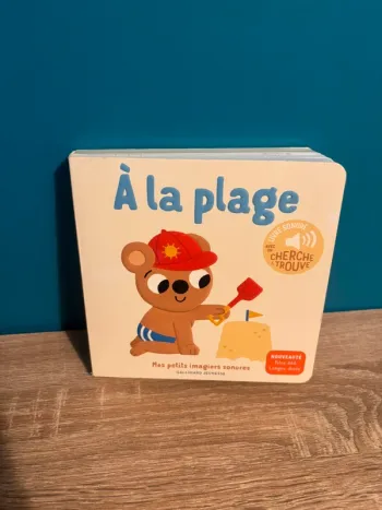 Livre sonore avec un cherche et trouve à la plage