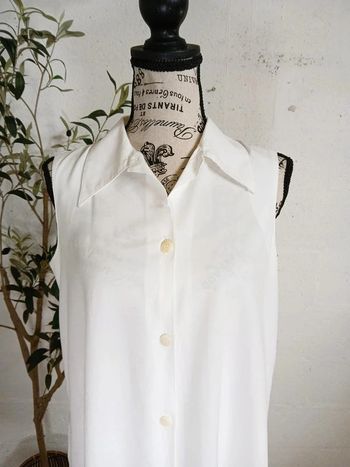 👚 Chemise longue sans manches blanche – Taille 38/40 – Très bon état