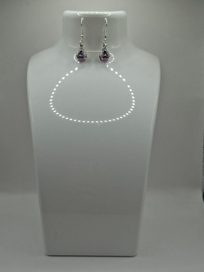 Boucle d'oreille patte de dragon