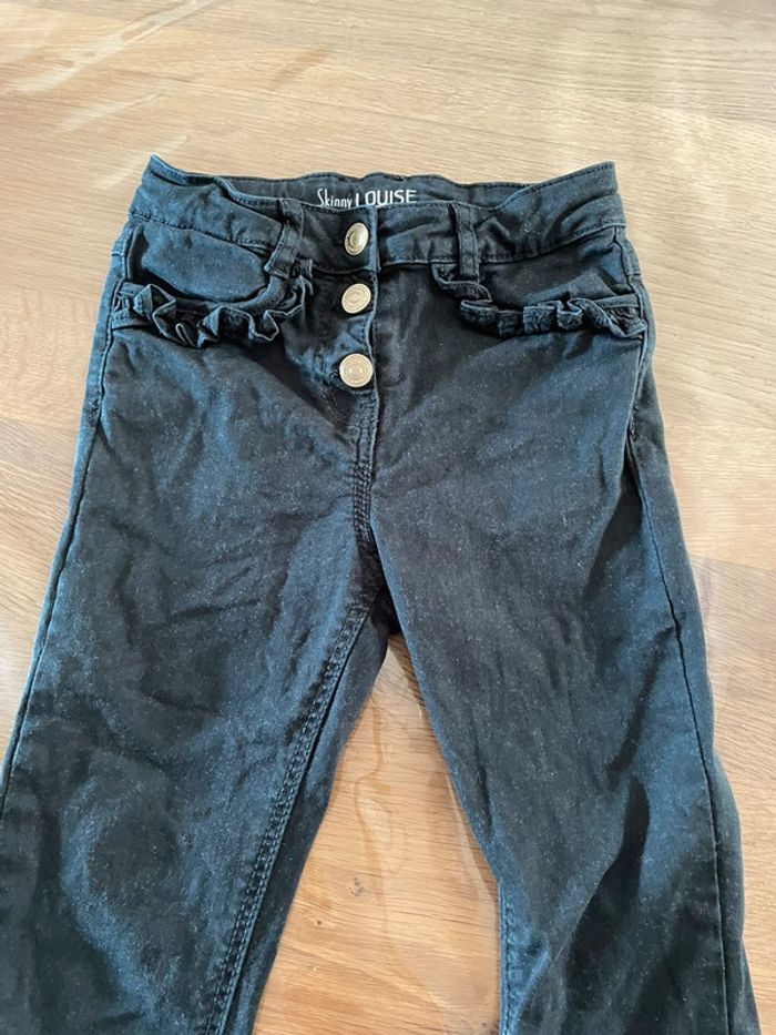 Jean noir skinny tape à l’œil 7 ans