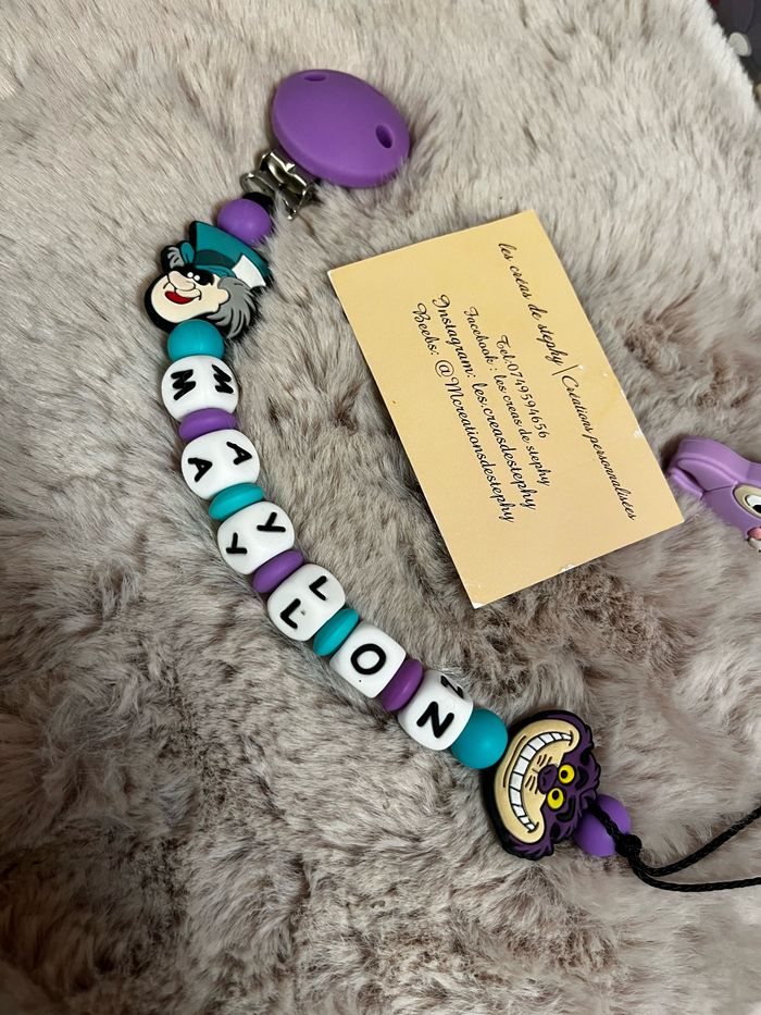 Attache tétine chat de cheschire Alice