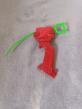 Lanceur Toupie avec Poignée Ergonomique Rouge et Crémaillère Verte