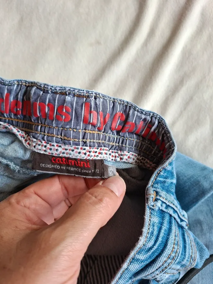 Jeans fille bleu usé de base, taille 12 ans, marque Catimini, en très bon état - photo numéro 3