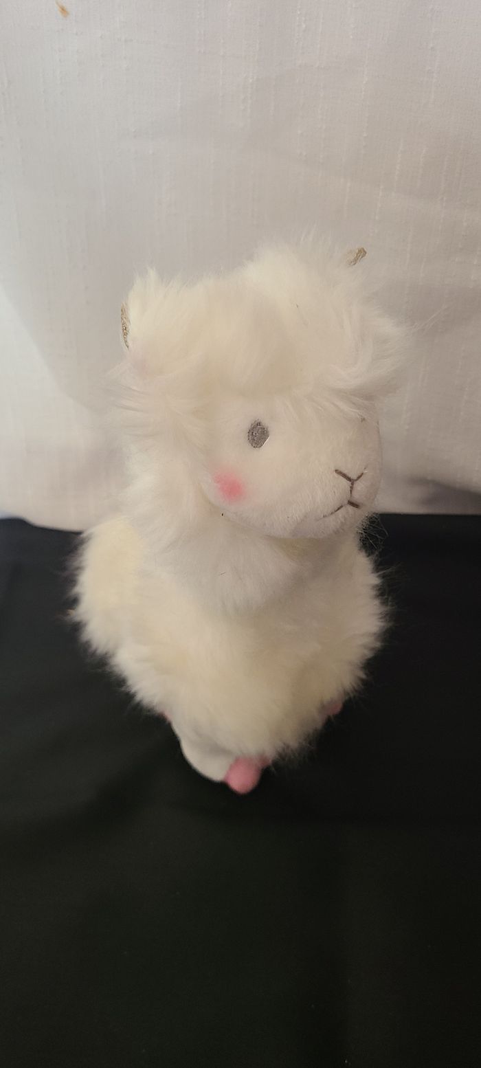 Peluche Doudou lama blanc marque Histoire D'ours rose