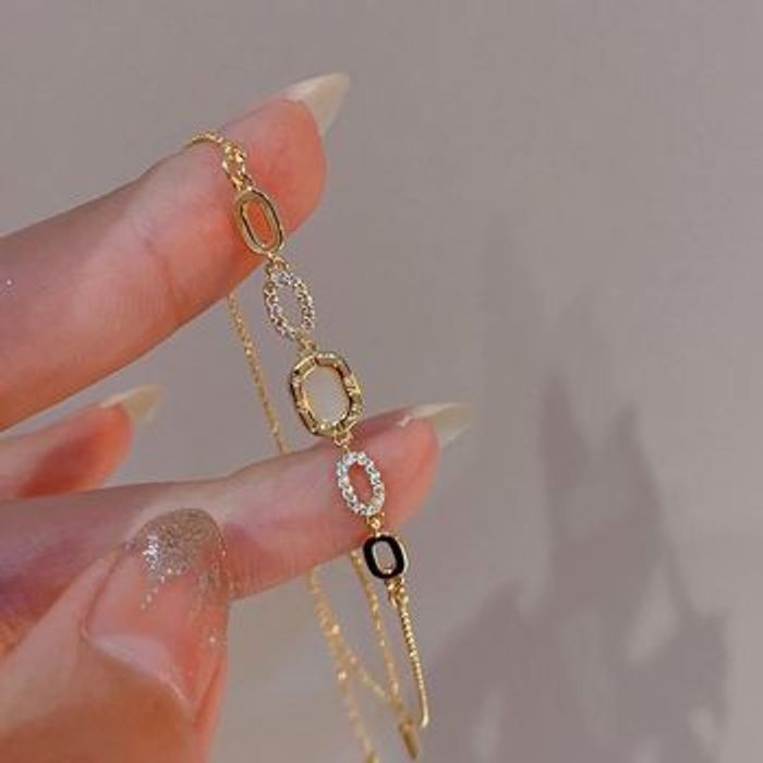 Rare bracelet en zircone plaqué or 18 carats - photo numéro 1
