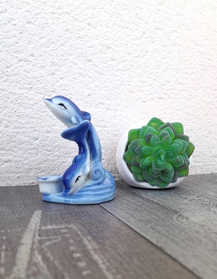 Figurine dauphins en céramique