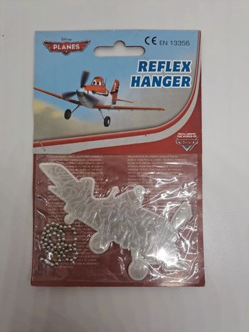 Porte-clés réfléchissant, Planes.
10,5x5,5cm.
NEUF.