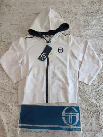 Gilet neuf. Sergio Tacchini . 6 ans