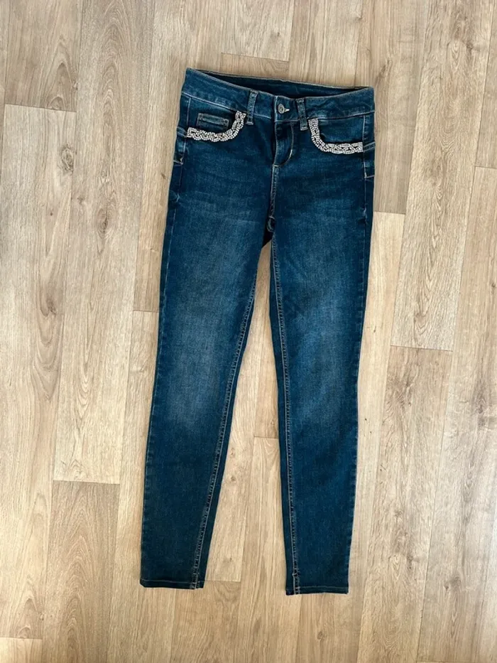 Liu jo jean bleu brut, strass sur poche femme, taille Fr 36 / us 26