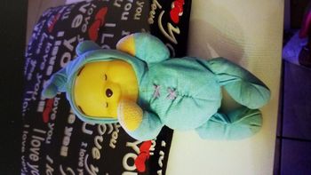 Poupon lumineux et musical   très bon état