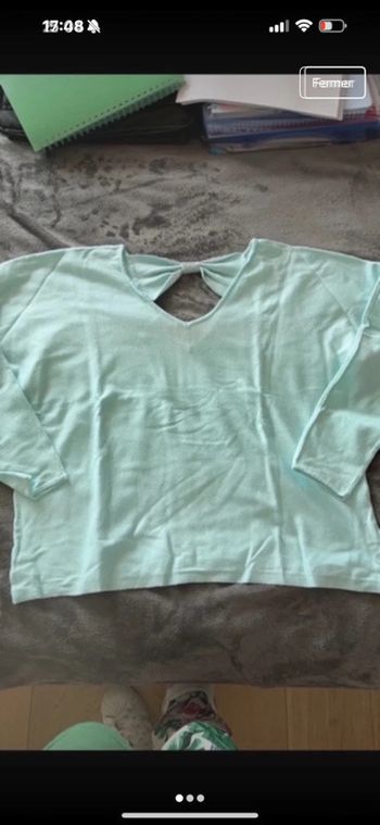 Pull avec noeud en strass