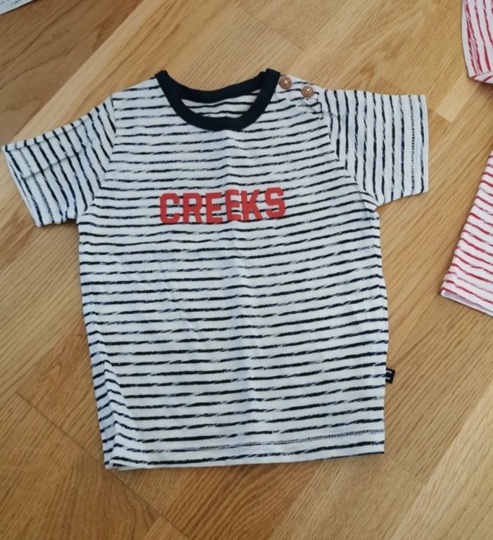 Lot 10 tee shirts manches courtes 6-9 mois