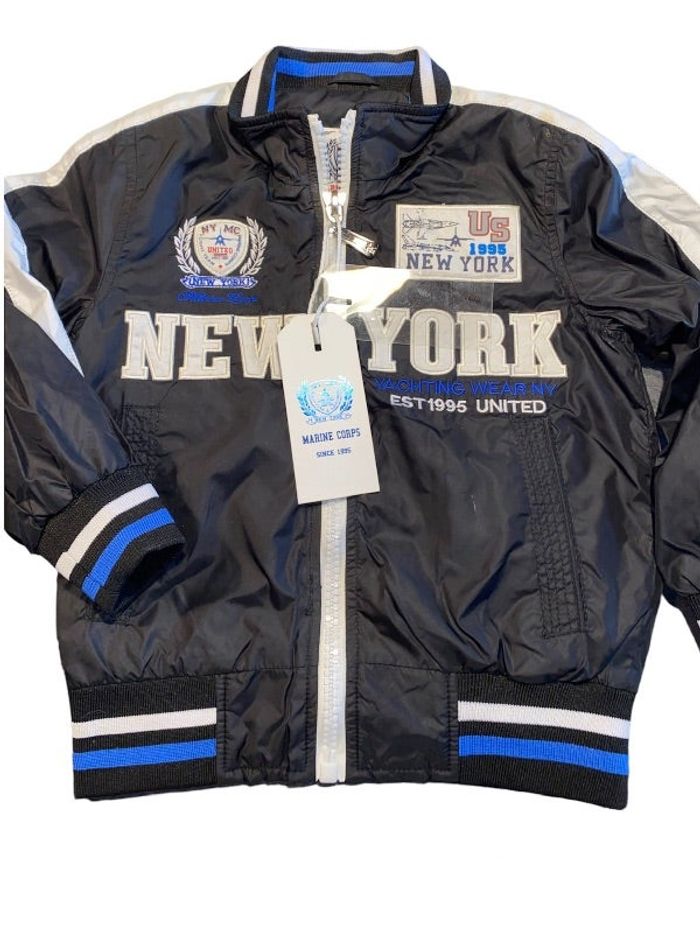 Veste mi saison 4 ans neuve