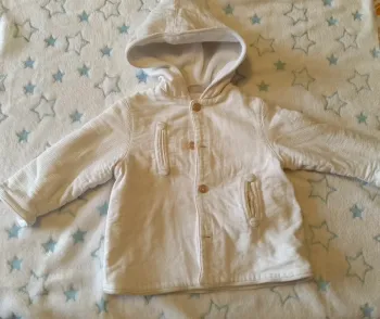 Manteau hiver blanc.