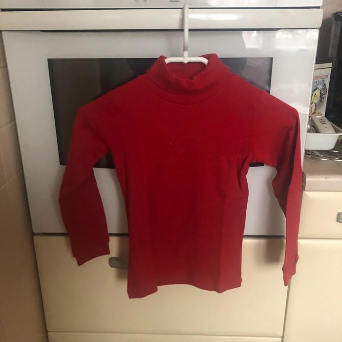 Pull col roulé rouge