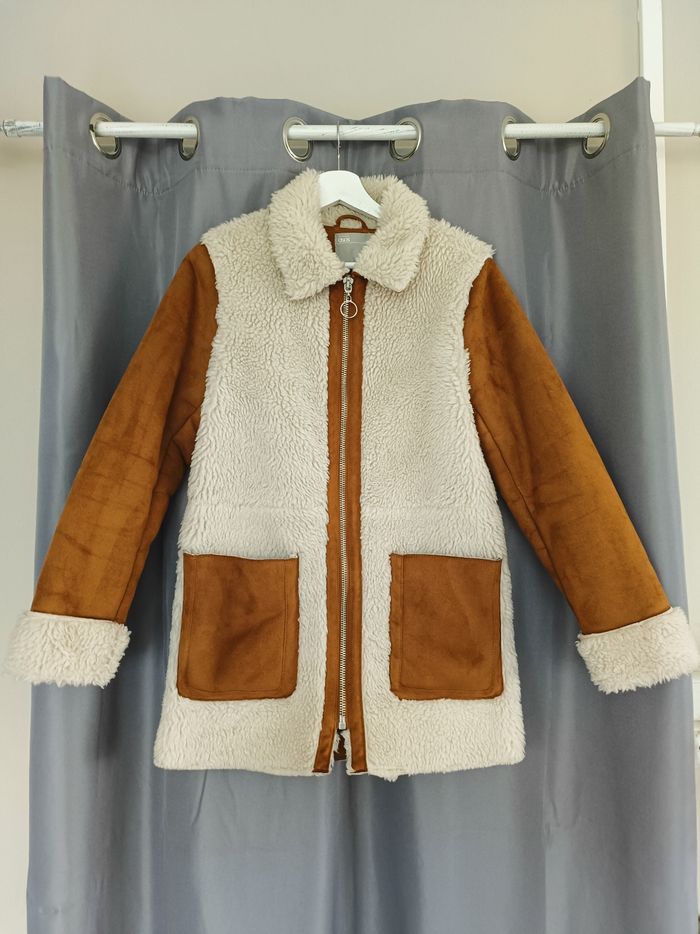 Veste fausse fourrure