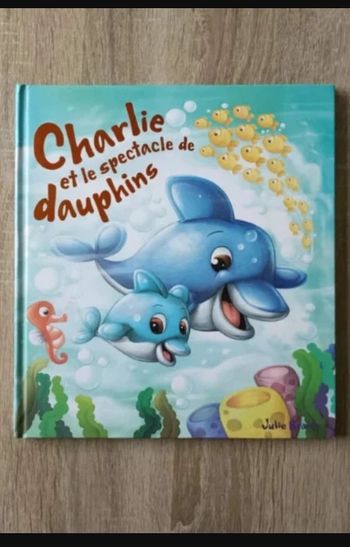 Livre Charlie et le spectacle de dauphins Très bon état