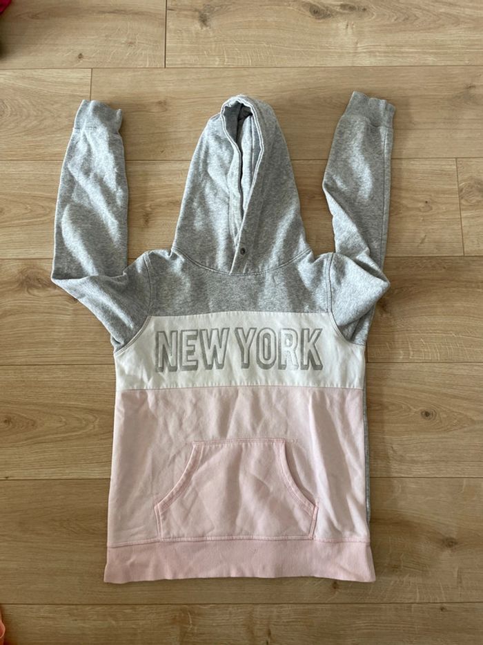 pull rose et gris taille 152