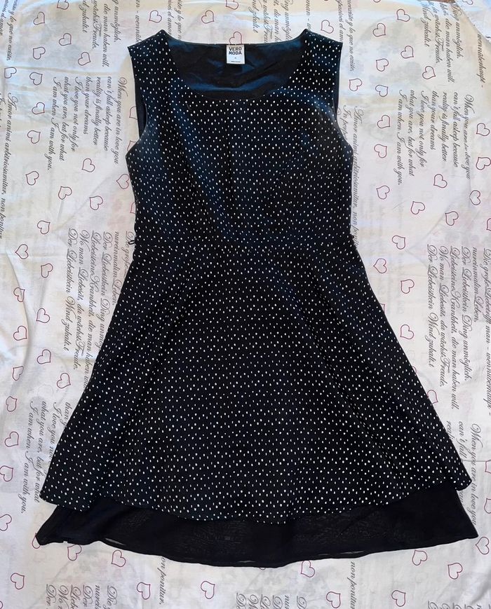 Abito corto nero a pois bianchi