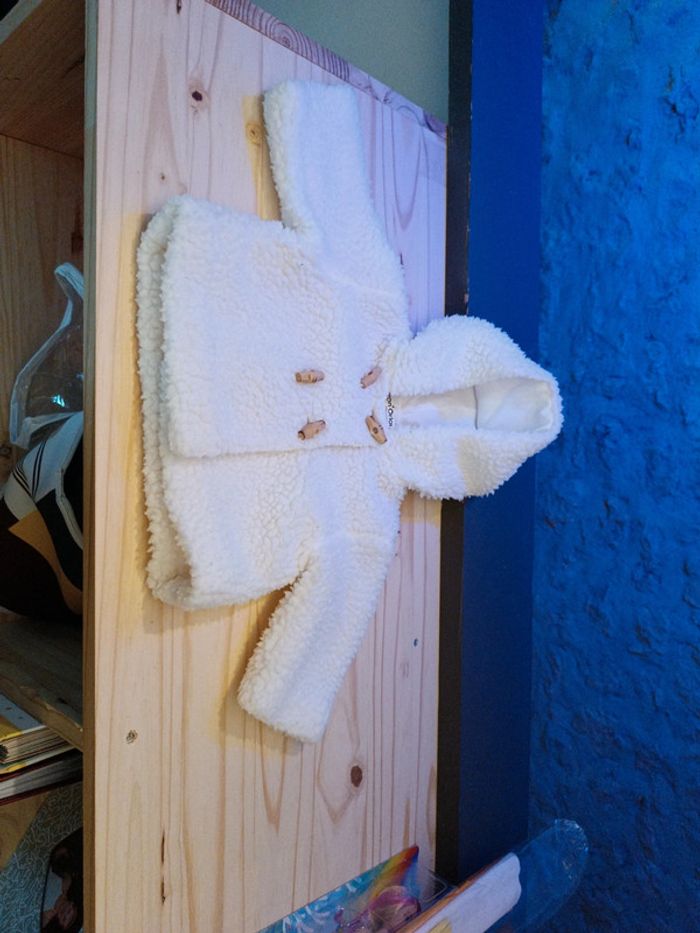Manteau blanc 6 mois.