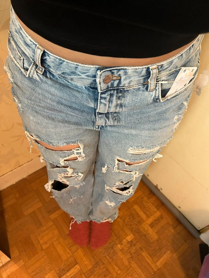 Jeans bleu clair effet déchiré • taille 42 - photo numéro 3
