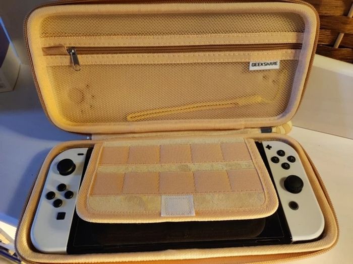 Console Nintendo Switch OLED Blanc 64Go + 2 Jeux + Sacoche + Carte Micro SD - photo numéro 9