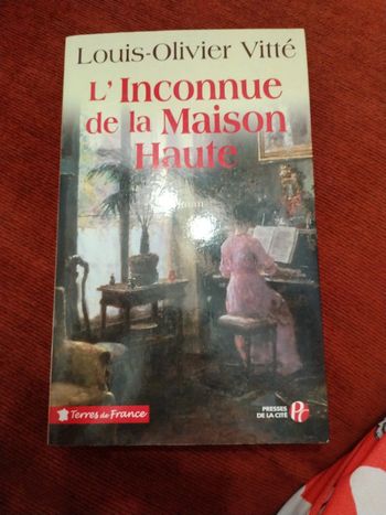 L'inconnue de la maison haute
