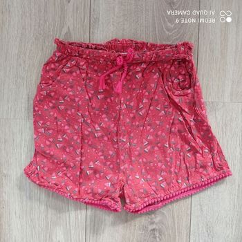 Short rouge orangé à motifs 8ans