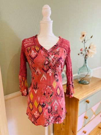 Tunique 36 rose à motifs tbe